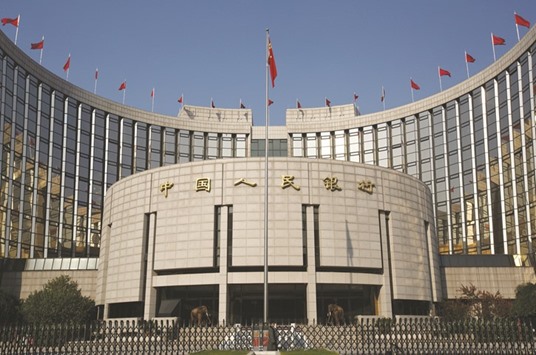 The Peopleu2019s Bank of China headquarters is seen in Beijing. The central bank, while reaffirming a long-standing commitment to prudent policy, said on Friday it would pay more attention to maintaining a u201cneutralu201d stance and ensure that it is u201cneither too tight nor too looseu201d.