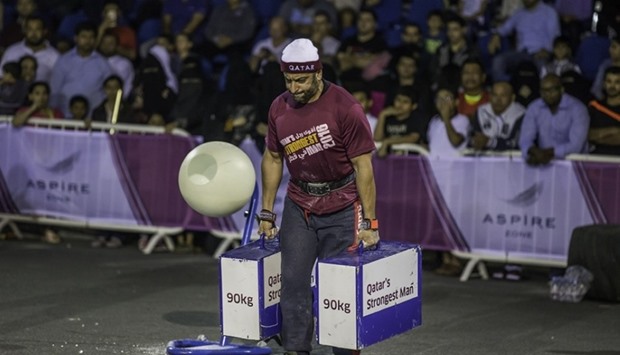 Champion Fahad al-Haddad walks 20 metres while holding 180kg in less than 10 seconds.