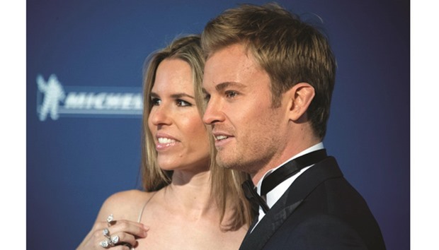 Formula One World Champion Germanyu2019s Nico Rosberg and his Wife Vivian arrive for the FIA Prize Giving Gala at the Hofburg palace in Vienna, Austria. (AFP)