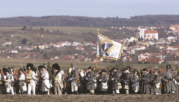 History enthusiasts, dressed as soldiers, fight during the re-enactment of Napoleonu2019s famous battle of Austerlitz.