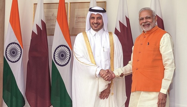 HE the Prime Minister and Interior Minister Sheikh Abdullah bin Nasser bin Khalifa al-Thani and Indian Prime Minister Narendra Modi shake hands prior to a meeting in New Delhi yesterday.