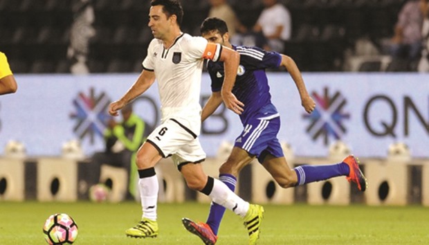 Al Sadd captain Xavi in action against Al Khor in the QSL on Friday.