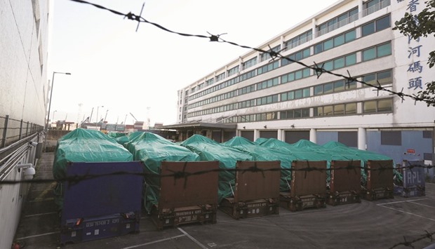 Armoured troop carriers, belonging to Singapore, are detained at a cargo terminal in Hong Kong, China.