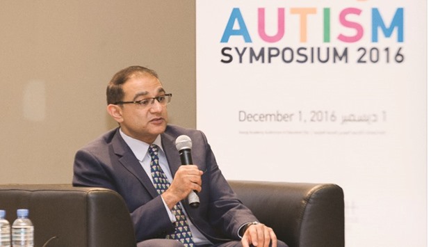 Dr Mohamed Waqar Azeem speaking at autism symposium.