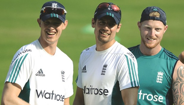 Englandu2019s Keaton Jennings (L), captain Alastair Cook (C) and Ben Stokes look on during a training session at the Wankhede stadium in Mumbai yesterday. (AFP)
