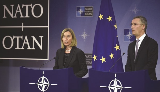 Mogherini and Stoltenberg at a news conference following a meeting of Nato foreign ministers in Brussels.