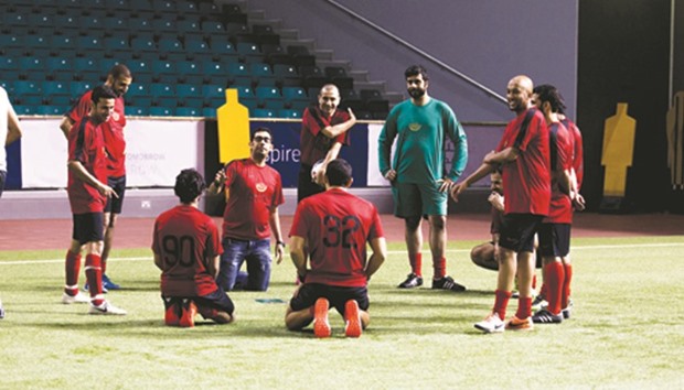 Masraf Al Rayanu2019s players warm-up ahead of their Aspire Banks Tournament match.