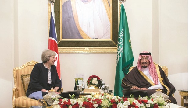 Custodian of the Two Holy Mosques King Salman of Saudi Arabia meeting with British Prime Minister Theresa May during the GCC Summit yesterday in the Bahraini capital Manama.