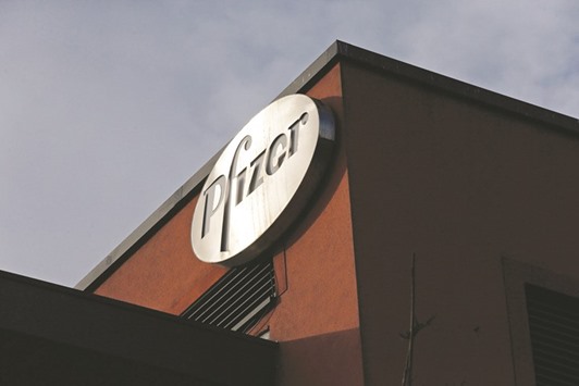 A company logo is seen at the Pfizer offices in Dublin. The UKu2019s Competition and Markets Authority fined Pfizer u00a384.2mn ($106mn) and Flynn Pharma u00a35.2mn after they increased prices by as much as 2,600% in September 2012, the regulator said yesterday.