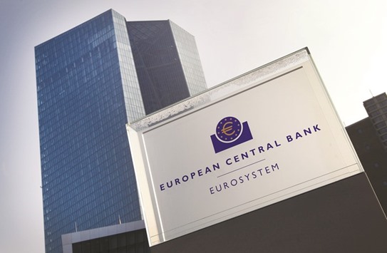 The headquarters of the European Central Bank is seen in Frankfurt. The central bank will decide at a two-day meeting starting today whether to prolong a $1.8tn purchase programme due to end in March, and if there will be any slowdown in bond-buying.