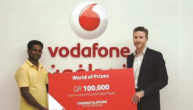 Prasanna Gedara received his cheque from Vodafoneu2019s director of marketing, Luke Longney.