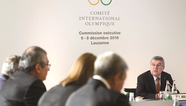 International Olympic Committee (IOC) president Thomas Bach (right) speaks at the opening of an executive meeting in Lausanne yesterday. (AFP)