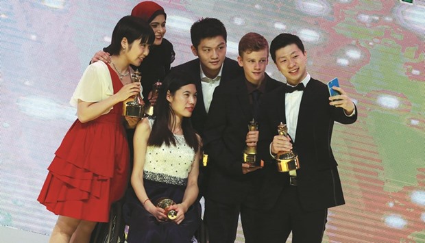 Awardees take a selfie at the ITTF Star Awards in Doha on Thursday.