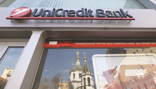 A logo is seen outside a UniCredit branch in Moscow. The sale of 32.8% of Bank Pekao will lift UniCreditu2019s CET1 capital ratio 55 basis points above its September 30 level, the Italian bank said in a statement.