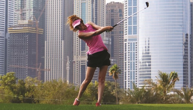 Florentyna Parker of England plays a shot during the third round of the Dubai Ladies Masters at the Emirates Golf Club yesterday. (AFP)