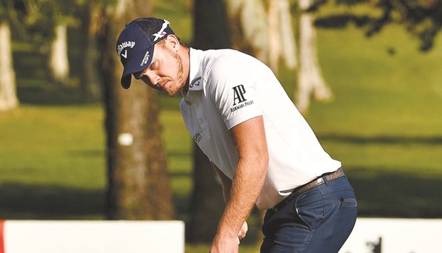 Englandu2019s Danny Willett putts during round two of the UBS Hong Kong Open yesterday. (AFP)