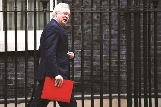 David Davis, UK exiting the European Union secretary, leaves following a cabinet meeting at No 10 Downing Street in London on November 14. Despite Davis striking a confident tone, EU officials say they will only launch negotiations on a legally binding trade treaty after Britain leaves and becomes a u201cthird countryu201d, according to draft negotiating guidelines.