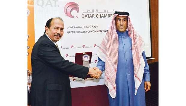 Qatar Chamber board member Ali bin Abdullatif al-Misnad and Indonesian Chamber of Commerce vice-chairman Helmy Shebubakar shaking hands after the meeting in Doha yesterday.