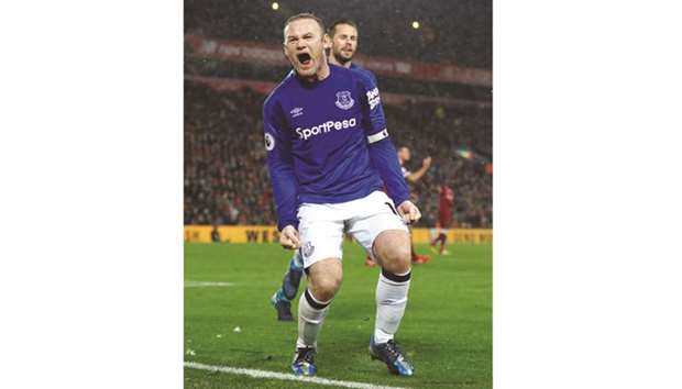Wayne Rooney celebrates scoring the equaliser for Everton yesterday.