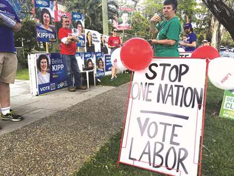 People campaigning at a polling station in Buderim in Queensland in this file picture.