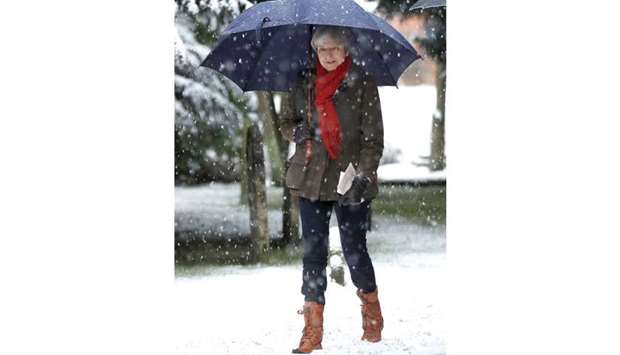 Prime Minister Theresa May leaves church, in Sonning, yesterday. The week ended with much of the British press hailing the prime minister as a hero for her Brexit deal.