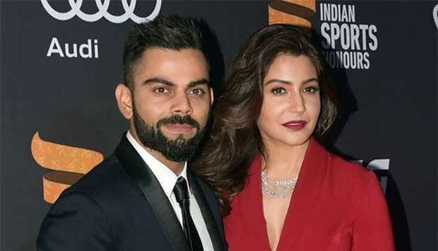 Indian cricketer Virat Kohli and Bollywood actress Anushka Sharma are seen in Mumbai in this file picture.