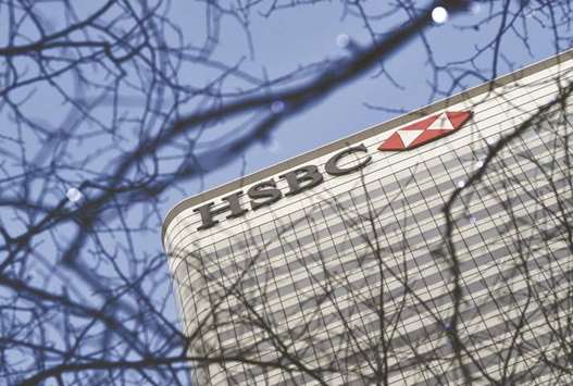 The HSBC headquarters is seen in the Canary Wharf financial district in east London. The US Justice Department will file a motion with a court in the Eastern District of New York seeking the dismissal of charges after HSBC u201clived up to all of its commitmentsu201d to improve its anti-money laundering and sanctions compliance capabilities, the bank said in a statement yesterday.