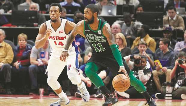 Boston Celtics guard Kyrie Irving (right) dribbles while defended by Detroit Pistons guard Ish Smith in the second-half of their NBA game at Little Caesars Arena. PICTURE: USA TODAY Sports