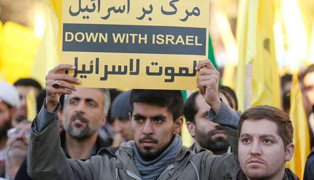 Iranian protesters hold anti-Israeli slogans during a demonstration in the capital Tehran.