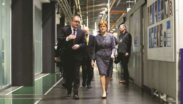 Scotlandu2019s First Minister Nicola Sturgeon visits the Rolls-Royce plant at Inchinnan, Scotland, yesterday.