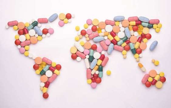 Pills in world map shape.