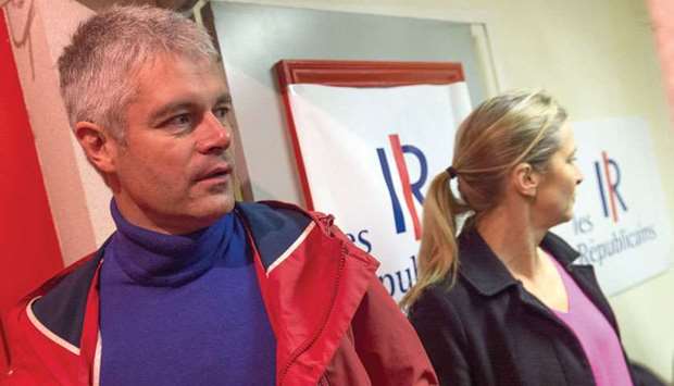 This picture taken on Sunday shows Wauquiez and his wife Charlotte at the party headquarters.
