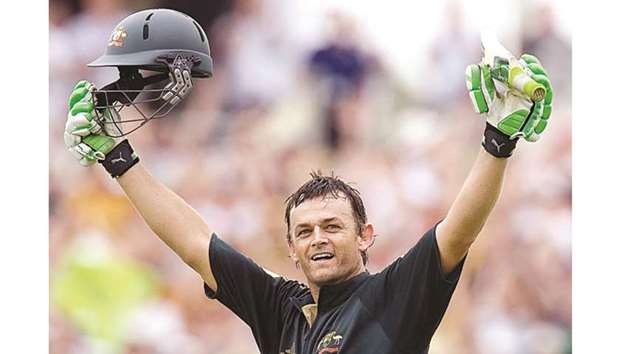 This file photo taken on February 15, 2008 shows Australian opening batsman Adam Gilchrist celebrating his century against Sri Lanka at the WACA ground in Perth.