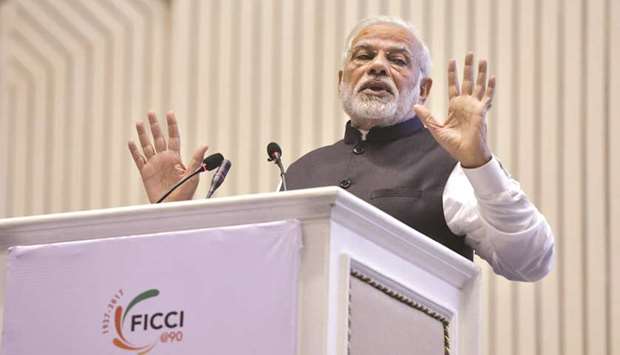 Prime Minister Narendra Modi speaks at the FICCI annual general meeting in New Delhi yesterday.
