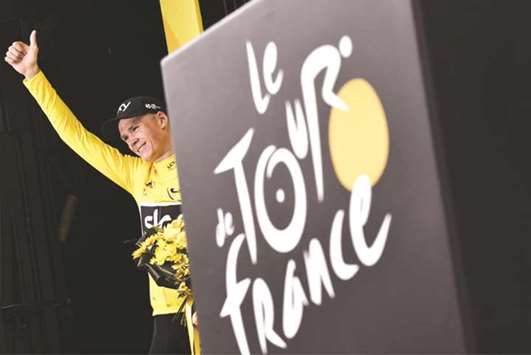 File photo of Froome celebrating his Tour de France win earlier this year.