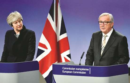 British Prime Minister Theresa May and European Commission chief Jean-Claude Juncker giving a press conference when they met for Brexit negotiations on December 4, at the European Commission in Brussels.