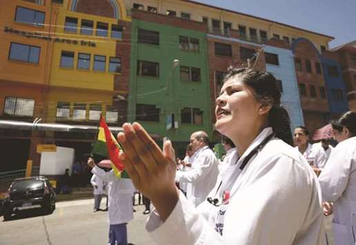 Healthcare employees protest in front of the Arco Iris Hospital in La Paz, Bolivia, against the government policies.