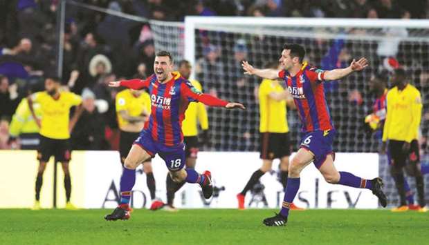 Crystal Palaceu2019s James McArthur (right) celebrates after scoring a goal against Watford in their EPL game. (Reuters)