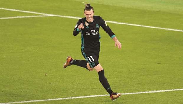 Real Madridu2019s Gareth Bale celebrates in Abu Dhabi yesterday.