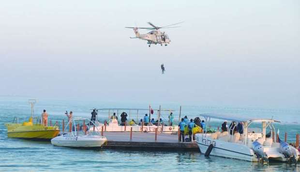 Qatar Armed Forces hold an aerobatic air show at Katara to mark QND