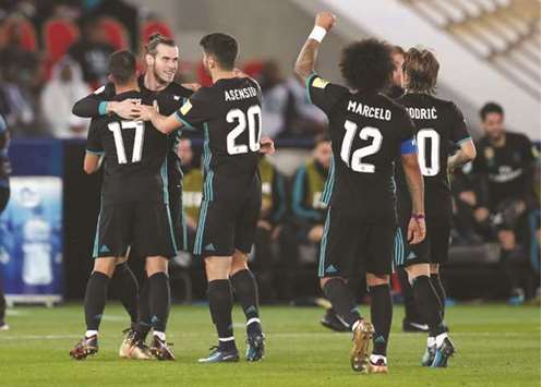 Real Madridu2019s Gareth Bale celebrates scoring their second goal with teammates during their FIFA Club World Cup semi-final. (Reuters)