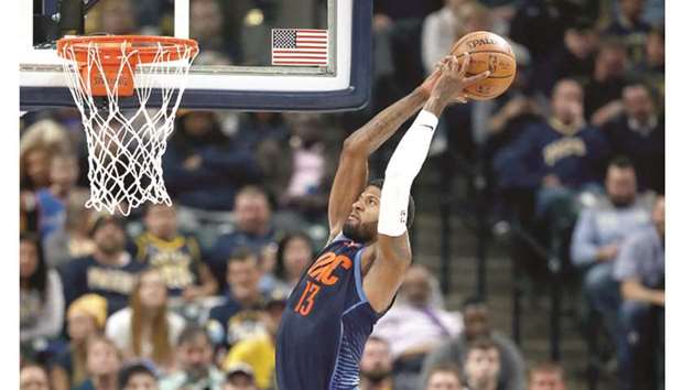 Paul George of the Oklahoma City Thunder goes up to dunk the ball against the Indiana Pacers in Indianapolis, Indiana. (Getty Images/AFP)