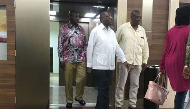 Zimbabwe's former president Robert Mugabe walks out of a lift at the Gleneagles Hospital in Singapore on Friday.