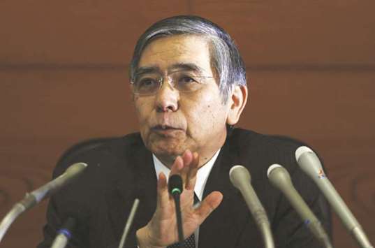 The Bank of Japan governor Haruhiko Kuroda at a press conference in Tokyo. The BoJ has consistently said it will continue its powerful easing programme because its 2% inflation target remains distant, sources said yesterday.