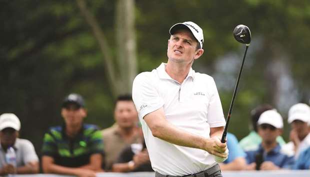 Justin Rose of England plays a shot during round two of the Indonesian Masters in Jakarta yesterday. (AFP)