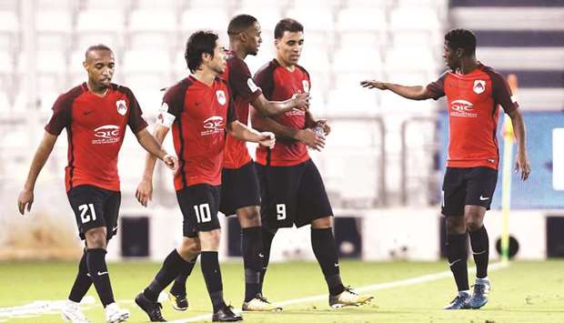 Al Rayyan have the firepower to go all the way. At bottom, their coach Michael Laudrup.