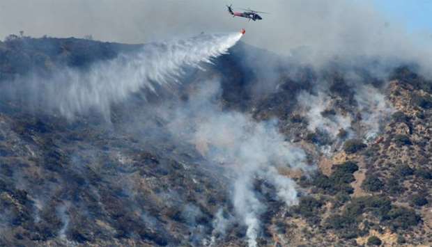 Firefighters continue to battle the Thomas fire, a wildfire near Fillmore, California