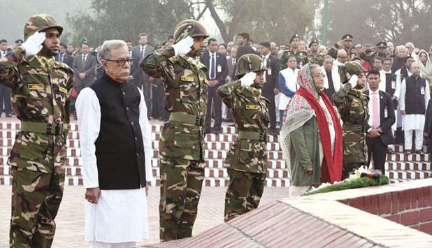 President Abdul Hamid and Prime Minister Sheikh Hasina pay tributes to the martyrs of the Liberation War by placing wreaths at the National Mausoleum at Savar yesterday.
