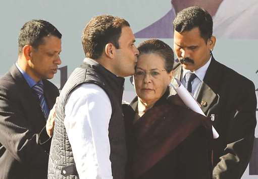 Rahul Gandhi kisses the forehead of his mother Sonia after taking charge as the president of the Congress party during a ceremony at the partyu2019s headquarters in New Delhi yesterday.
