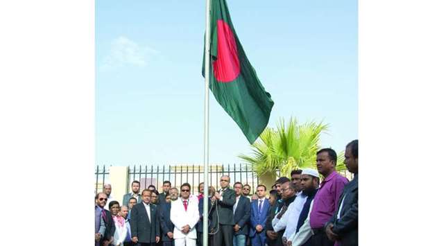 Ambassador Ashud Ahmed hoisting the national flag on the occasion of the 47th anniversary of Bangladesh's Victory Day.